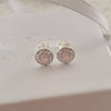 Silver round pink crystal earrings