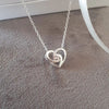 Silver heart knot necklace