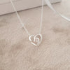 Silver love friendship knot necklace