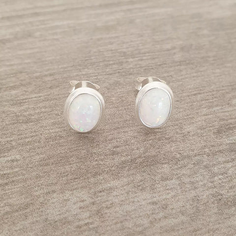 Silver synthetic opal earrings