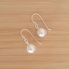Dangle pearl earrings