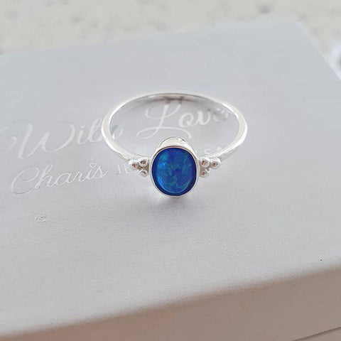 Silver blue pacific blue synthetic opal ring