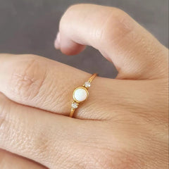 Gold synthetic opal ring