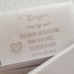 Heart gift necklace with note.
