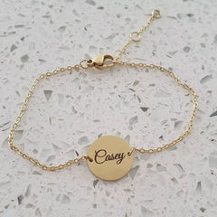 Personalized disc bracelet