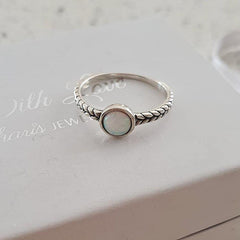Silver synthetic opal stone ring