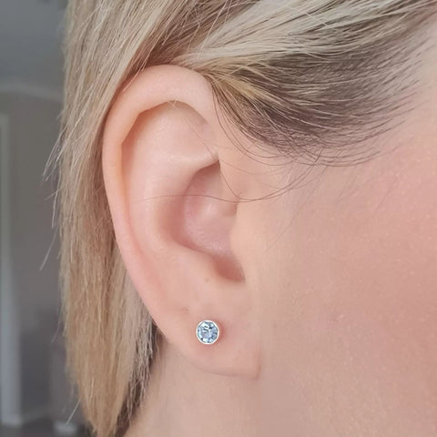 light blue sapphire ear stud earrings