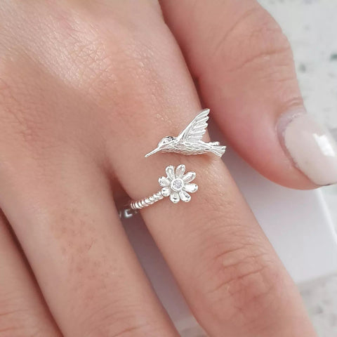 silver flower and bird ring